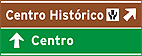 Turística (marrom) + destino (verde) — Exemplo de Compatibilização Entre Placa de Orientação Turística e Placa de Orientação de Destino